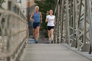 Couple jogging outside photo