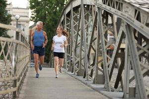 Couple jogging outside photo