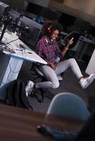 portrait of a young successful African-American woman in modern office photo