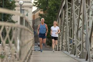 Couple jogging outside photo