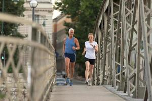 Couple jogging outside photo