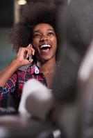 portrait of a young successful African-American woman in modern office photo