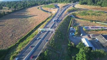 High Angle View of Luton Airport Junction Interchange of Motorways M1 J10 at Luton City of England UK. it is Connection Luton City and London Luton Airport Image Created on 11th August 2022 with Drone video