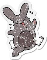 distressed sticker of a cartoon rabbit vector