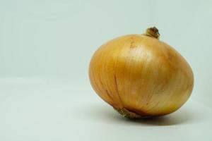 Fresh Raw Bulb Onions in whole isolated on a white background. photo