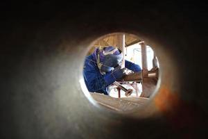 welder at factory work photo