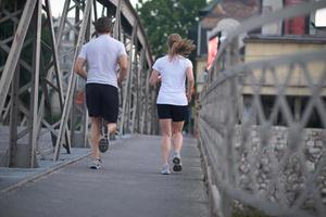 Couple jogging outside photo