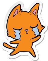 sticker of a crying cartoon cat vector