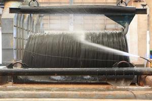 Large spools of Steel Coils being moved. photo