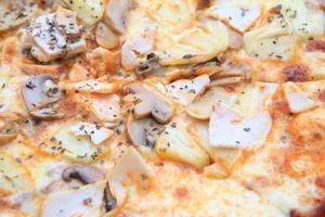 Pizza funghi with extra    mushrooms photo