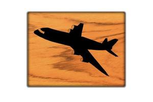 Airplane Sign icon on wood texture and background photo