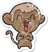 distressed sticker of a cartoon laughing monkey vector