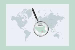 Map of South Sudan on political world map with magnifying glass vector