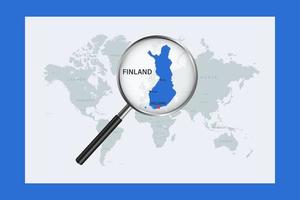 Map of Finland on political world map with magnifying glass vector