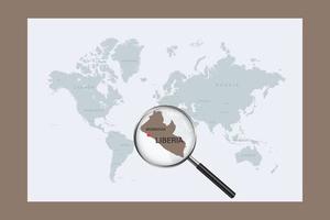 Map of Liberia on political world map with magnifying glass vector