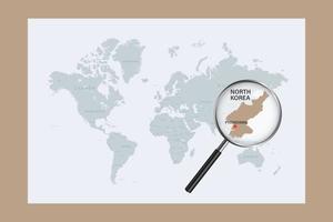 Map of North Korea on political world map with magnifying glass vector