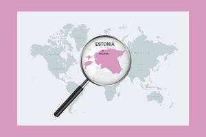 Map of Estonia on political world map with magnifying glass vector