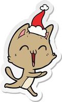 happy sticker cartoon of a cat meowing wearing santa hat vector