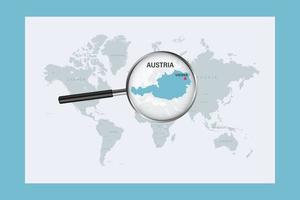 Map of Austria on political world map with magnifying glass vector