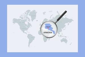 Map of Armenia on political world map with magnifying glass vector