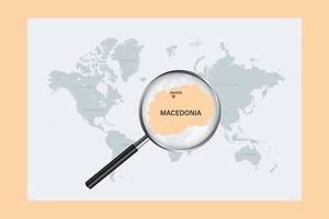 Map of Macedonia on political world map with magnifying glass vector