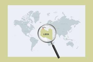 Map of Libya on political world map with magnifying glass vector