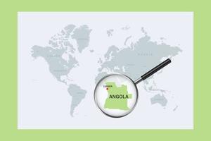 Map of Angola on political world map with magnifying glass vector