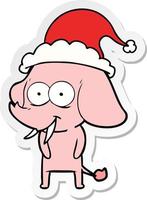 happy sticker cartoon of a elephant wearing santa hat vector