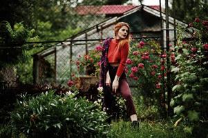 Fashion portrait of redhaired sexy girl outdoor. Model attractive seduction woman. photo