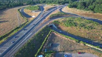 High Angle View of Luton Airport Junction Interchange of Motorways M1 J10 at Luton City of England UK. it is Connection Luton City and London Luton Airport Image Created on 11th August 2022 with Drone video