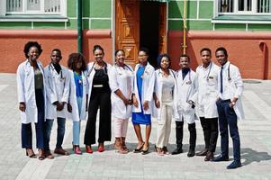 Group of african doctors students near medical university outdoor. photo