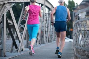 Couple jogging outside photo