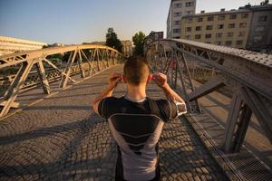 portrait of a jogging man at sunny morning photo