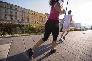 young couple jogging  in the city photo