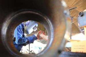 welder at factory work photo