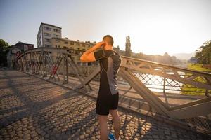 portrait of a jogging man at sunny morning photo