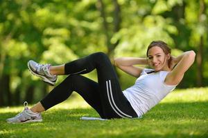 woman stretching before fitness photo