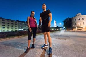 couple warming up and stretching photo