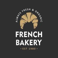 Vintage style bakery shop simple label, badge, emblem, logo template. Graphic food art with engraved croissant design vector element with typography. Linear organic pastry on black background.