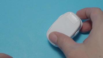 Oximeter usage. Finger pulse oximeter used to measure pulse rate and oxygen levels. video