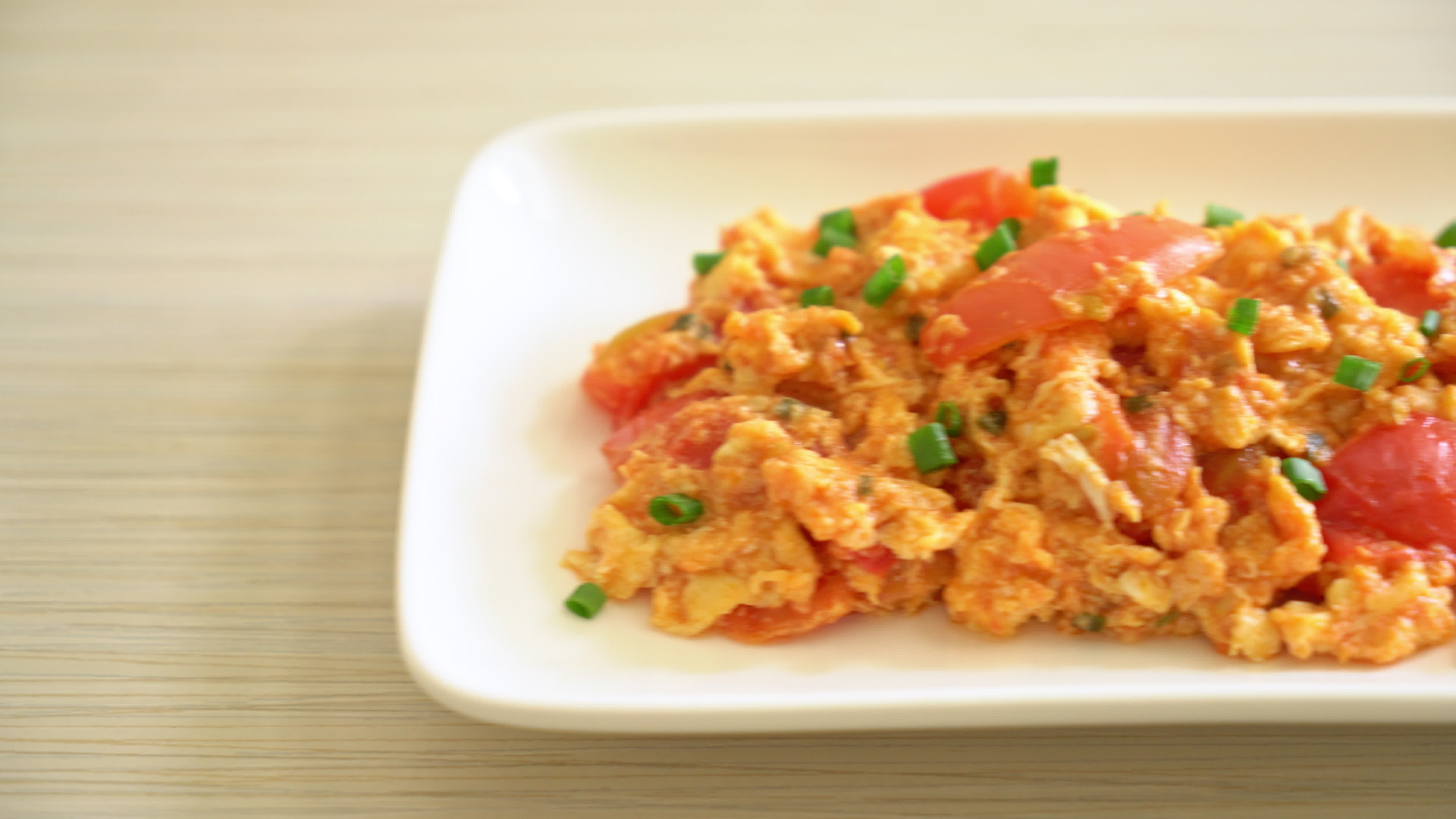Stirfried tomatoes with egg or Scrambled eggs with tomatoes healthy
