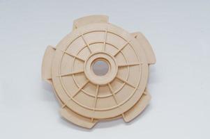 Spare part round disc for water pump isolated on white. photo