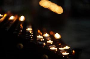 Row of red lights church candles. photo