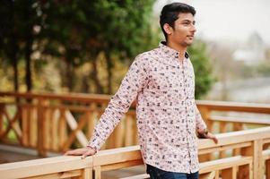 Indian man student at shirt posed outdoor. photo