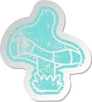 distressed old sticker of a single mushroom vector