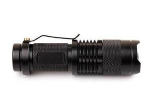 black metallic flashlight isolate on white background photo