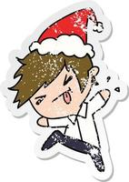 christmas distressed sticker cartoon of kawaii boy vector