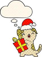 cute cartoon puppy with christmas present and hat and thought bubble in comic book style vector