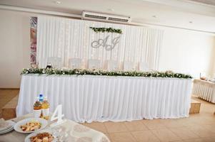 Wedding table set up in restaurant. photo