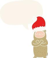 cartoon bear wearing christmas hat and speech bubble in retro style vector